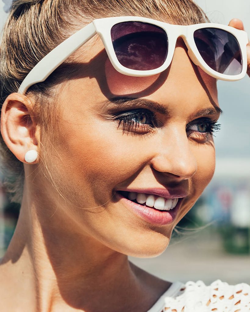 young-woman-with-sunglasses-smiling-2021-08-26-16-35-35-utc (1)